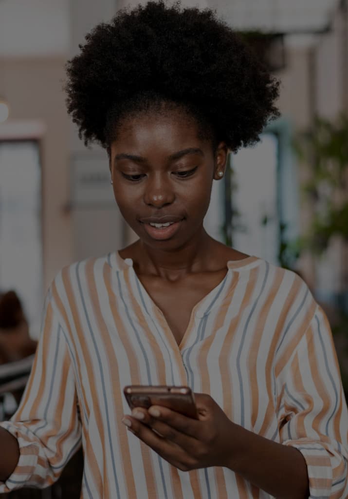 Mighty Finance customer using a smartphone